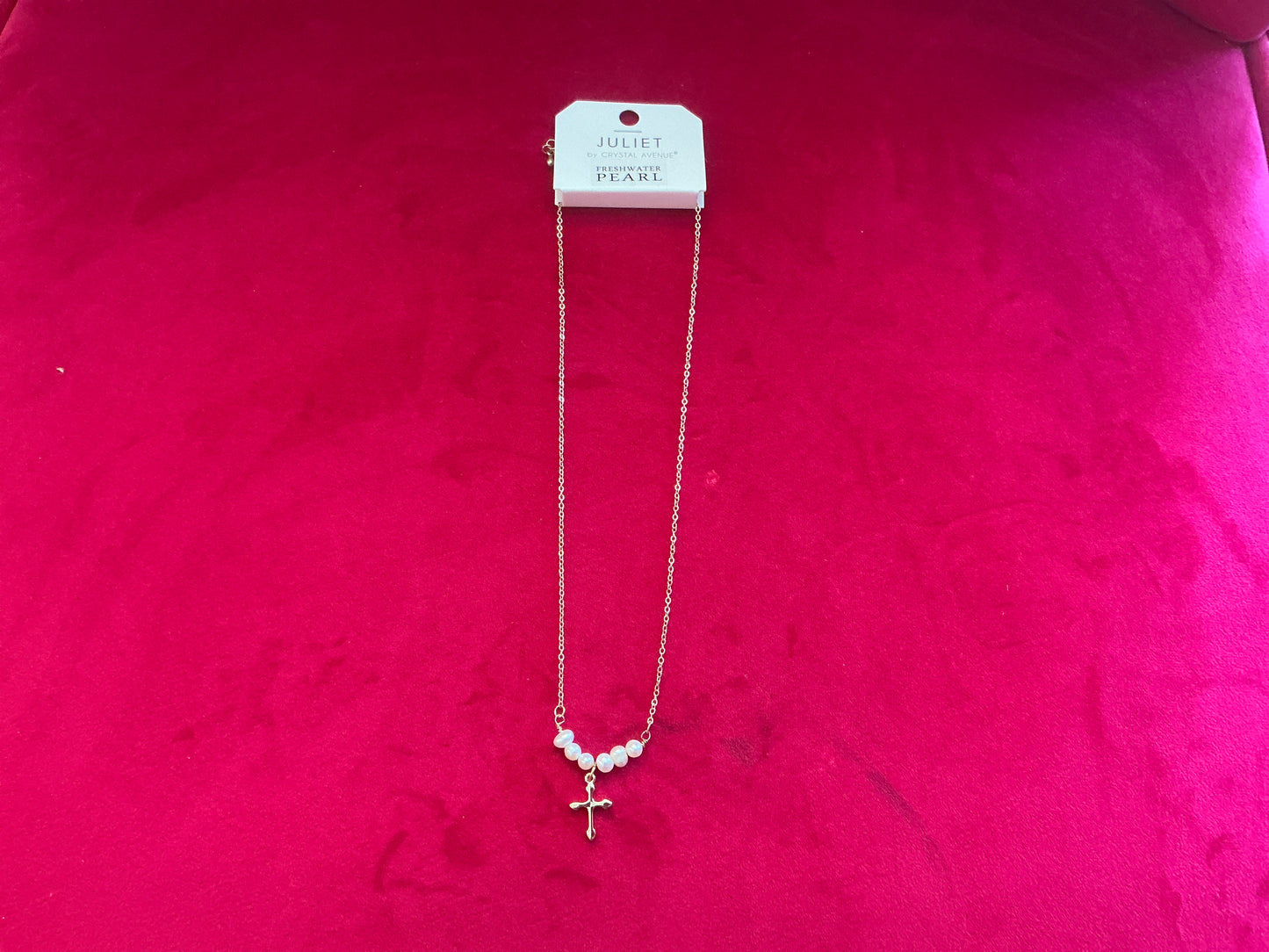 Cross necklace with pearl spacers