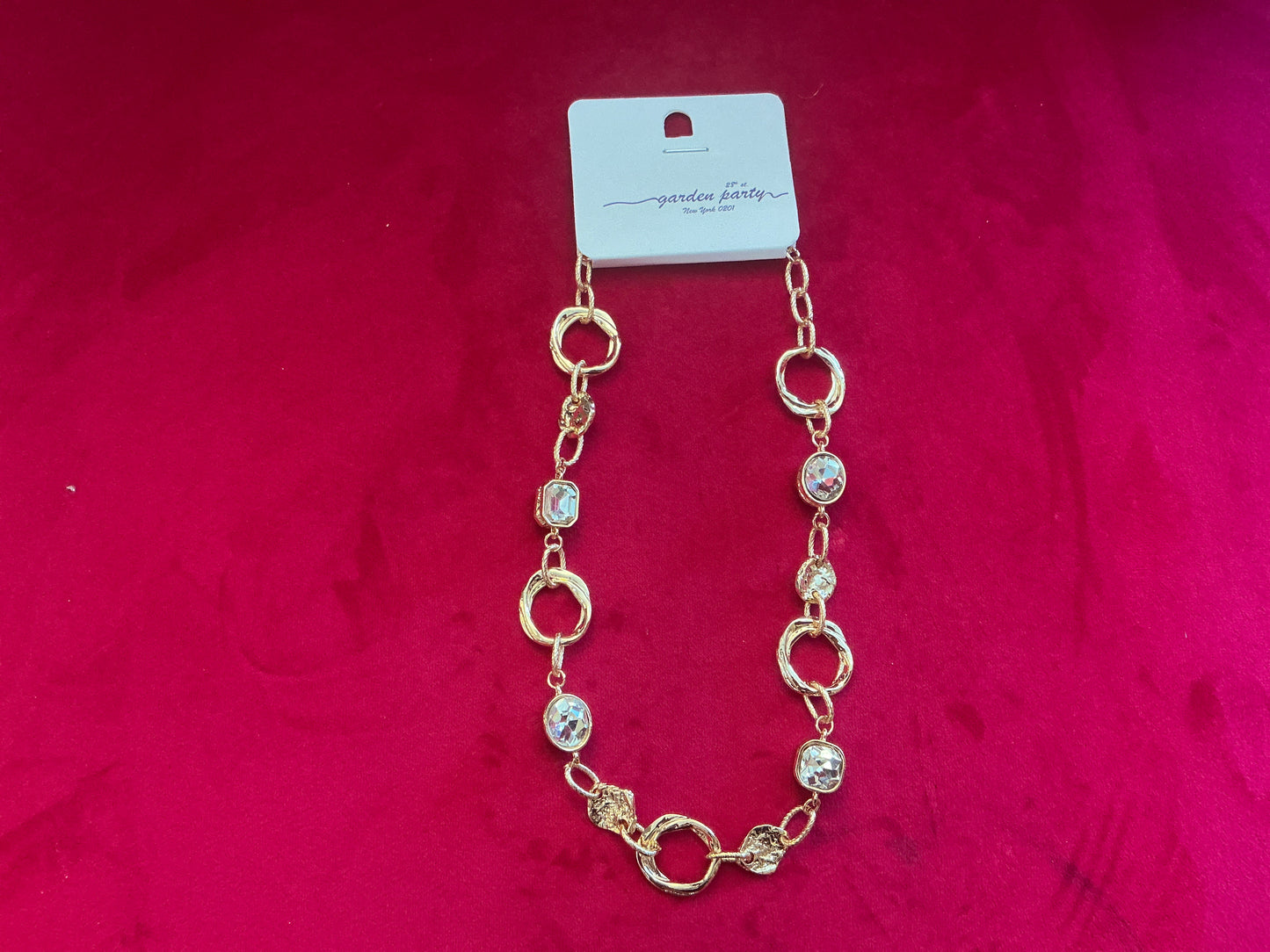 Gold paperclip necklace with rhinestones / hoop accents