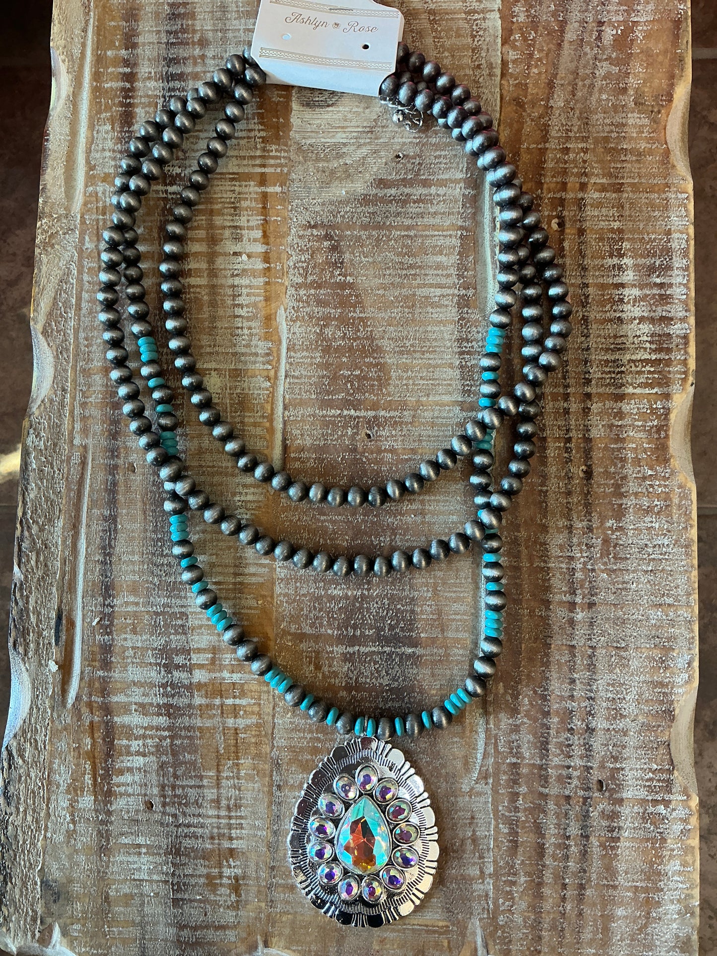 Long silver and turquoise layered necklace