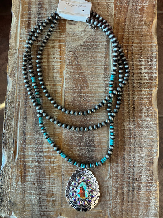 Long silver and turquoise layered necklace