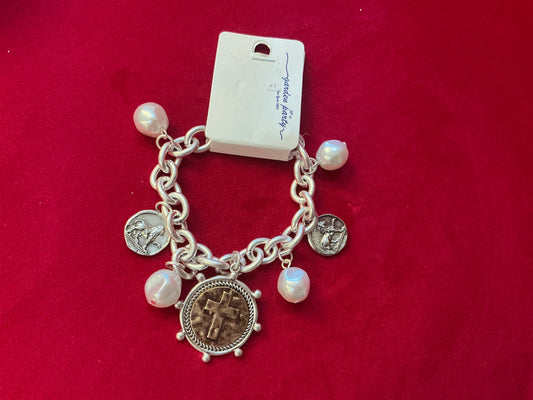Cross charm bracelet with pearls